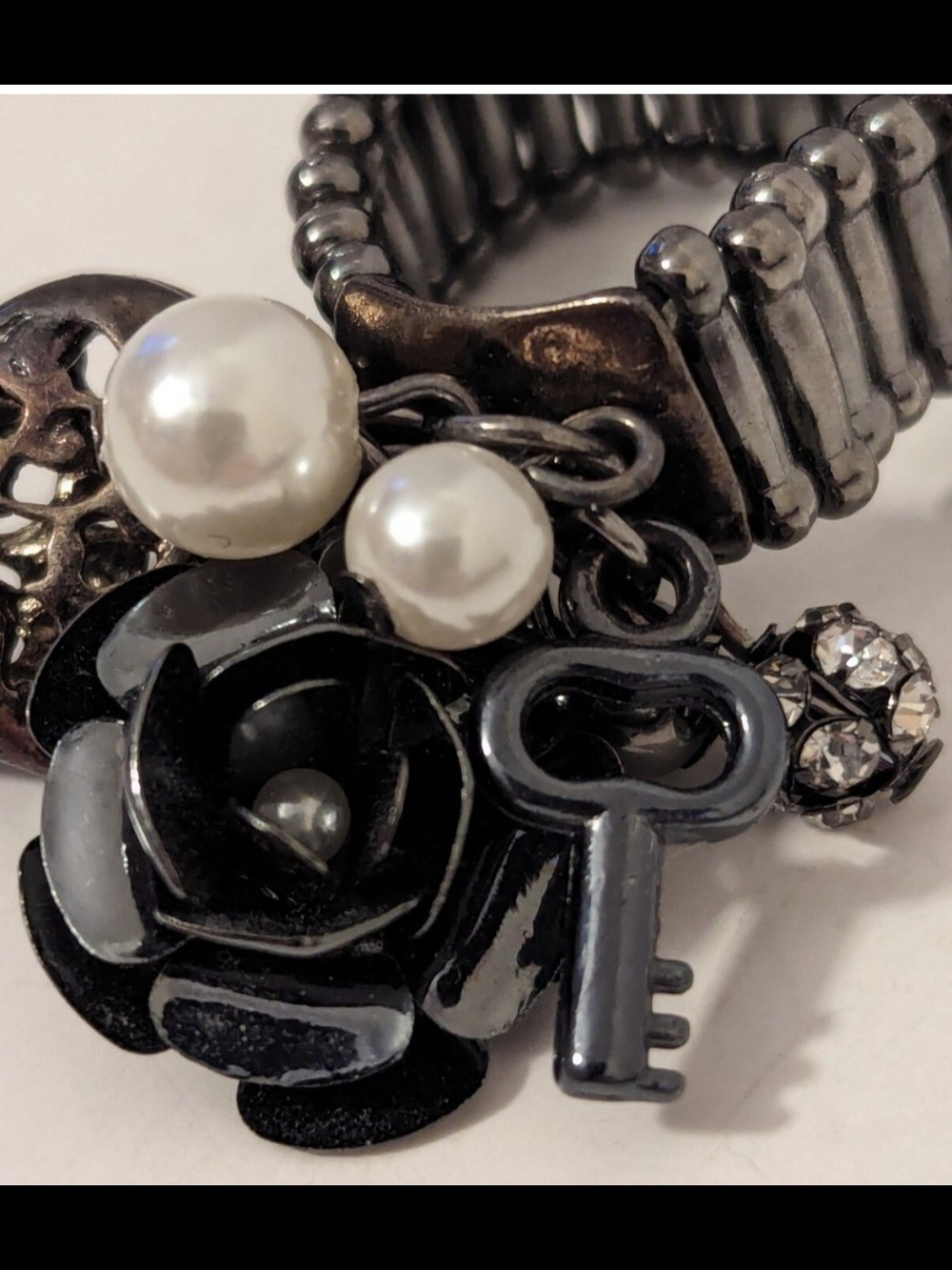 Vintage-Inspired Black Floral Charm Bracelet with Pearls